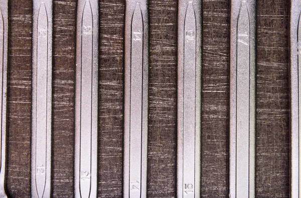 Wrenches on a metal background — Stock Photo, Image