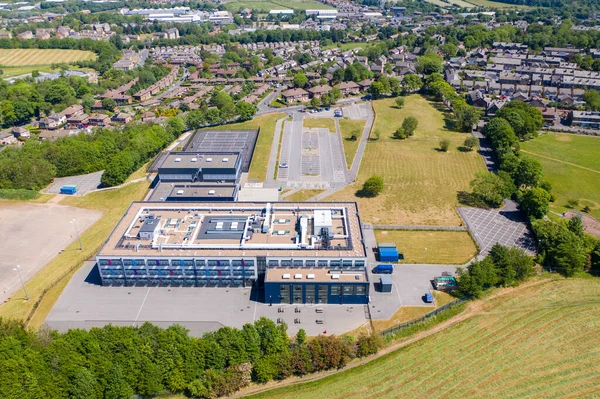 Aerial drone photo of the Whitcliffe Mount Primary School, showing an aerial photo of the British school building on a bright sunny summers day
