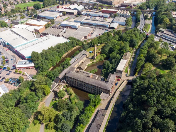 Aerial photo of the town of Armley located in Leeds West Yorkshire in the UK, showing a typical British town on a bright sunny day.