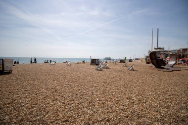 Brighton UK, 10th July 2019: The famous beautiful Brighton Beach and Seafront showing the coastline area on a bright sunny day, clipart