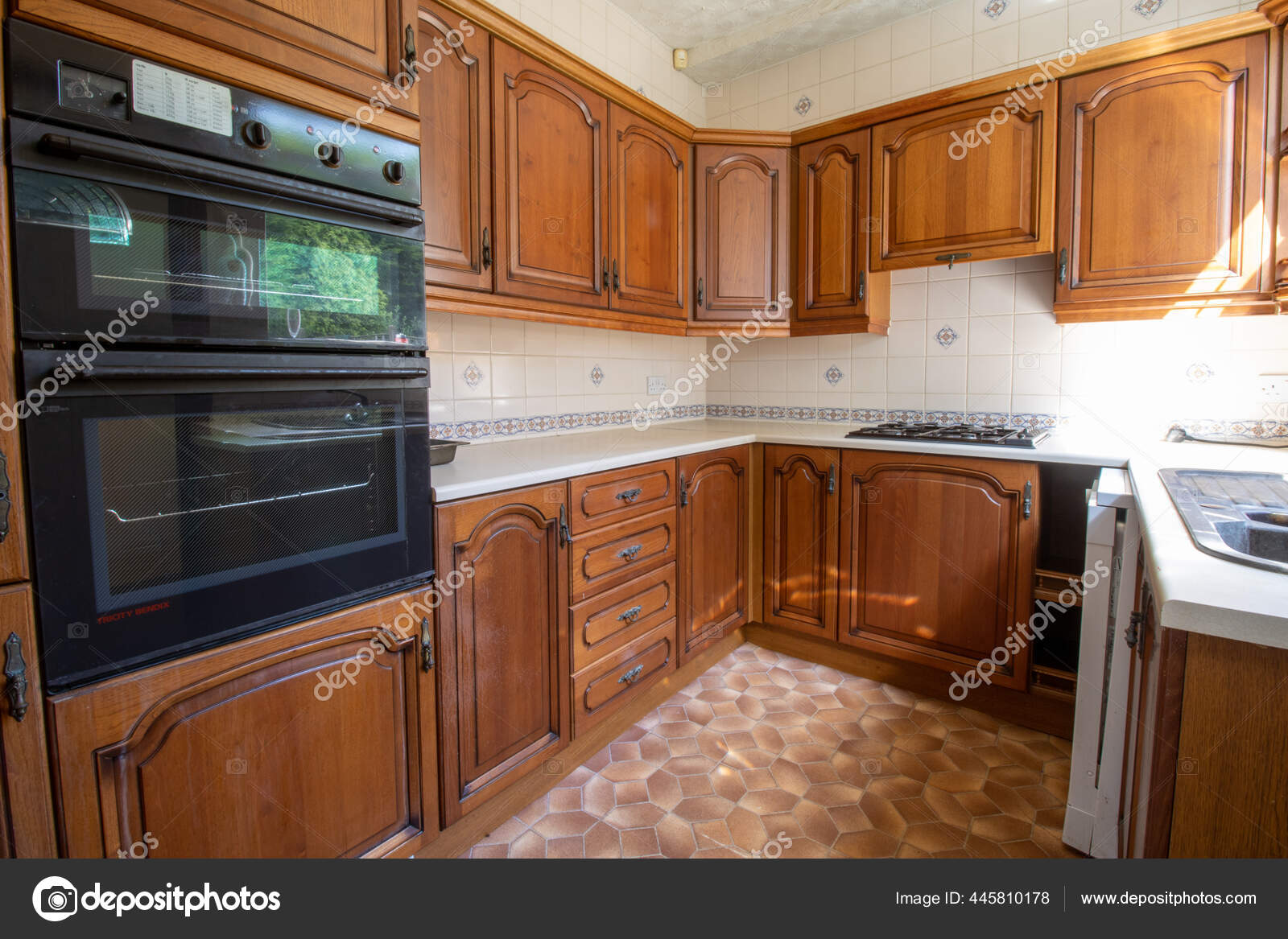 Old 80'S Style Interior Kitchen Showing Classic Brown British Kitchen