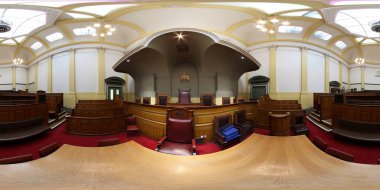 360 Degree panoramic sphere photo showing the interior of the historic Leeds Town Hall showing the old courtroom and judges seat clipart