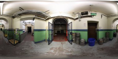 360 Degree panoramic sphere photo showing the interior of the historic Leeds Town Hall basement with iron gates clipart