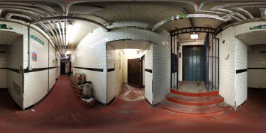 360 Degree panoramic sphere photo showing the interior of the historic Leeds Town Hall showing the basement and iron gates clipart
