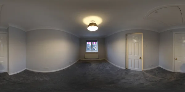 A 360 Degree Full Sphere Panoramic photo of a modern newly built house interior showing the British empty bedroom with a newly fitted carpet