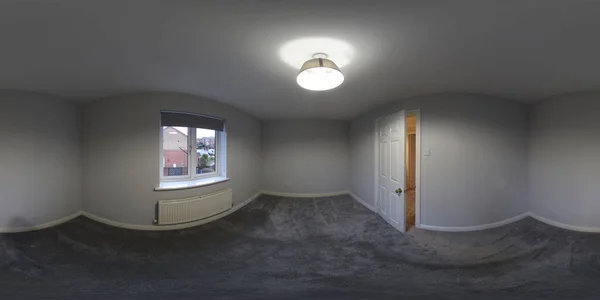 A 360 Degree Full Sphere Panoramic photo of a modern newly built house interior showing the British empty bedroom with a newly fitted carpet