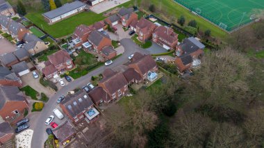 Aerial photo of a typical residential housing estate in the UK, taken in the village of Alverthorpe in Wakefield West Yorkshire showing a modern cul-de-sac residential housing estate in the spring