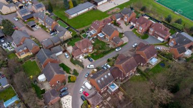 Aerial photo of a typical residential housing estate in the UK, taken in the village of Alverthorpe in Wakefield West Yorkshire showing a modern cul-de-sac residential housing estate in the spring