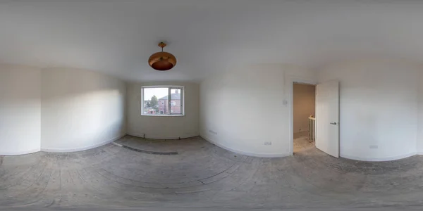 360 Degree panoramic sphere photo of construction working being done on an old British terrace house showing a small bedroom with wooden door frames and painting just being done in the room
