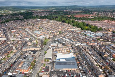 Aerial drone photo of the town centre of Scarborough North Yorkshire in the UK, showing rows of victorian terrace houses and residential housing estates in the seaside town in the summer time
