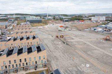 Rotherham South Yorkshire UK, 20th August 2025: Aerial drone photo taken in the town of Rotherham showing the ground being cleared for a new housing estate being built in the summer time