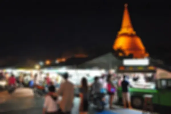 Fondo abstracto borroso del mercado nocturno Wat Phra Pathom Chedi, Tailandia . — Foto de Stock