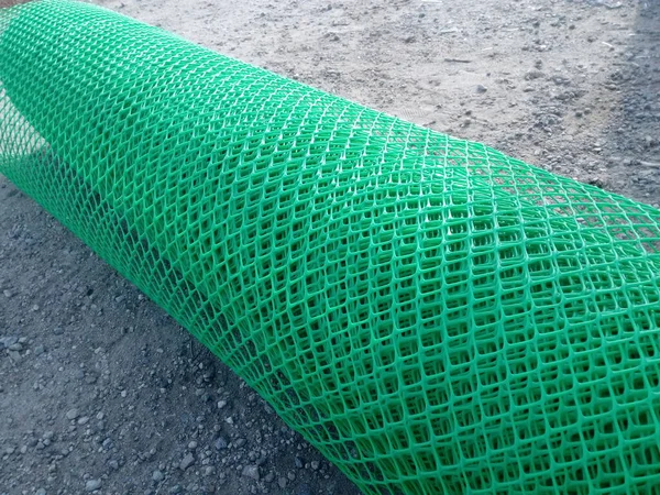 Green Plastic Mesh Roll Fencing — Stock Photo, Image