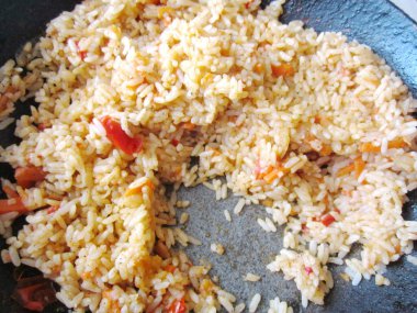 hot pilaf with spices and fresh vegetables