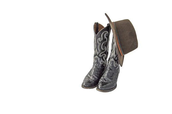 Par de botas de cowboy preto extravagante e um chapéu de outback marrom — Fotografia de Stock