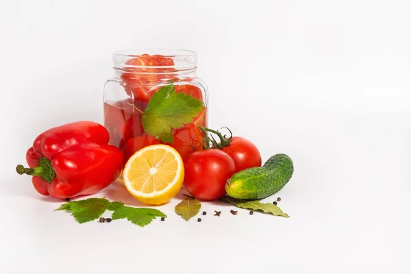 A jar of canned tomatoes. Vegetables are canned for preservation