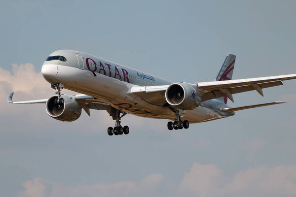 LONDON / UNITED KINGDOM - JULY 14, 2018: Qatar Airways Airbus A350-900 A7-ALS passenger plane landing at London Heathrow Airport