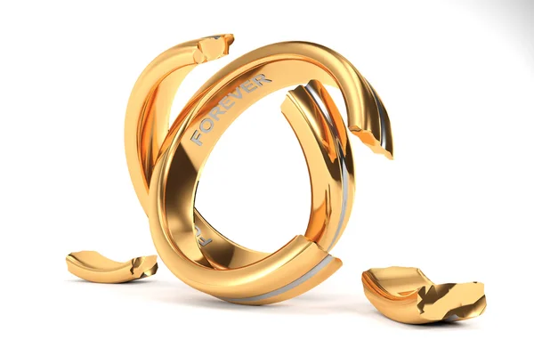 Gyllene vigselringar symboliserar skilsmässan mellan två människor Stockbild