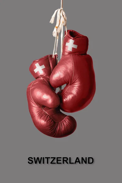 Boxhandschuhe in der Farbe der Schweiz — Stockfoto