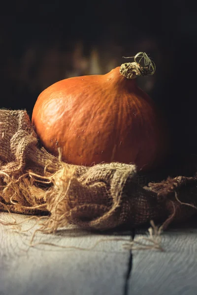 Hokkaido pumpkin on a wooden Table — Stock Photo, Image