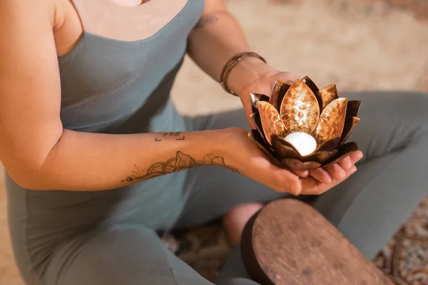 Woman Holding Lotus Shaped Candlestick Candle — Stock Photo, Image