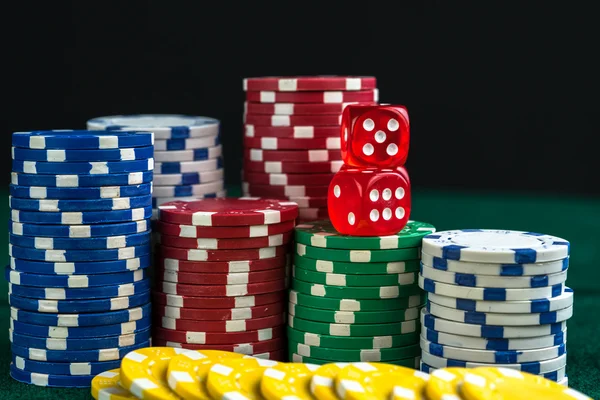 Gambling Red Dice and Money Chips — Stock Photo, Image