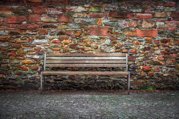 Mur z cegły i siedzenia tło — Zdjęcie stockowe