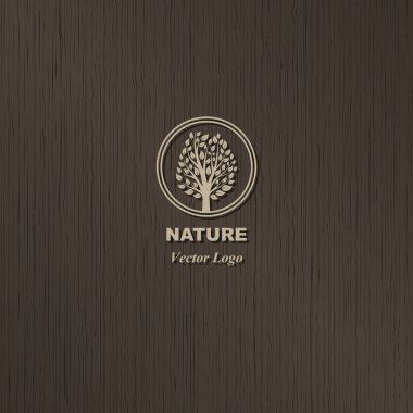 vector tree logo on brown wood background clipart