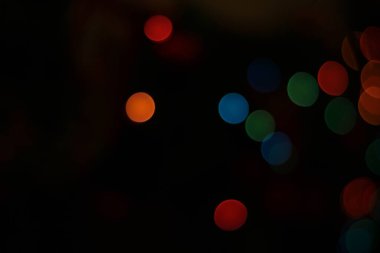 Çeşitli yuvarlak daireli kopyalama alanı olan koyu arkaplan