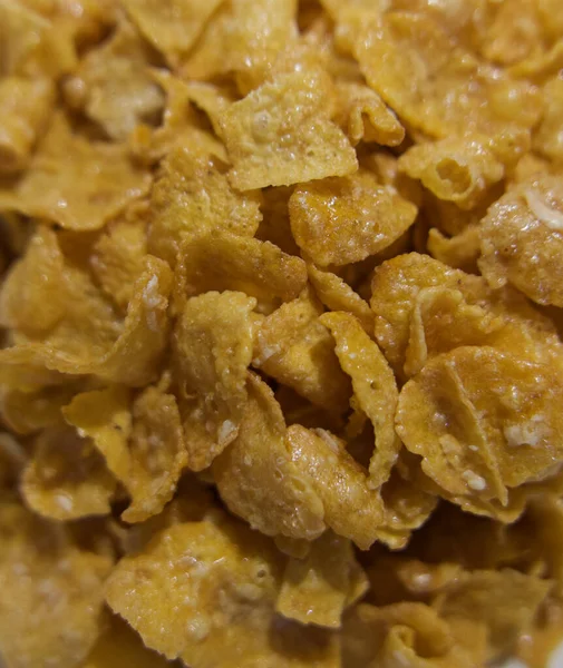 Fundo quadro completo close up imagem de ouro açucarado pequeno-almoço cereais — Fotografia de Stock