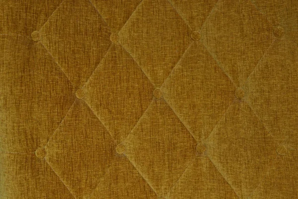 Fondo de tapicería de marco completo que muestra amortiguación abotonada en amarillo mostaza — Foto de Stock
