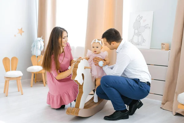 Young Family Plays One Year Old Daughter Children Room Girl — Stock Photo, Image