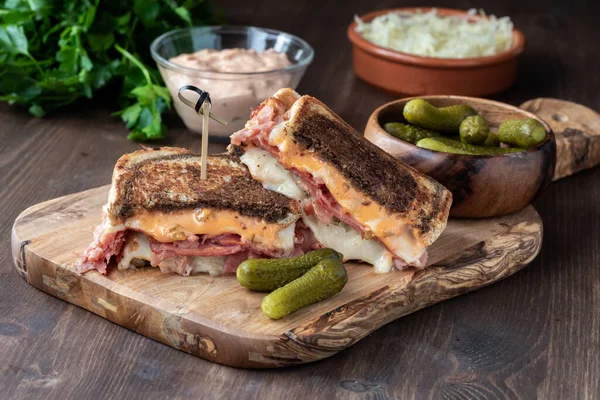 Close up of a grilled cheese Reuben sandwich on marble rye bread ready for eating. — 스톡 사진