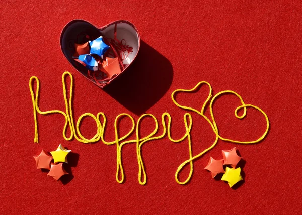 Happy ribbon greeting and hearts  and stars — Stock Photo, Image