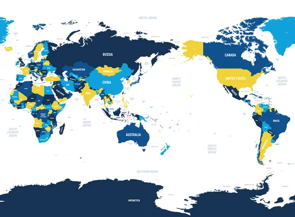 Mapa del mundo Asia, Australia y el Océano Pacífico centrado. Color naranja marrón sobre fondo oscuro. Mapa político detallado de Mundo con nombres de países, océanos y mares etiquetados — Vector de stock