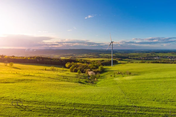 Wind turbine in green rural landscape from above — Stock Photo, Image