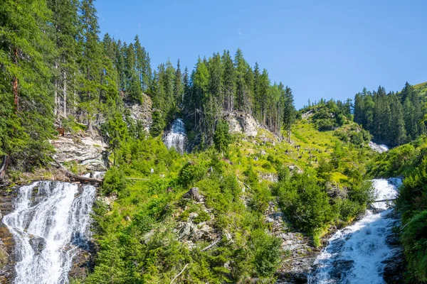 Confluence of two alpine waterfalls — Stock Photo, Image