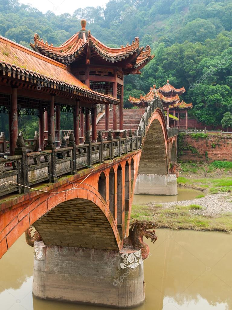 Typical chinese bridge near Leshan — Stock Photo © pyty 65320569