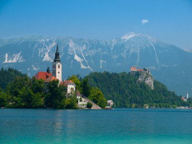 Bled lake with island church and castle clipart