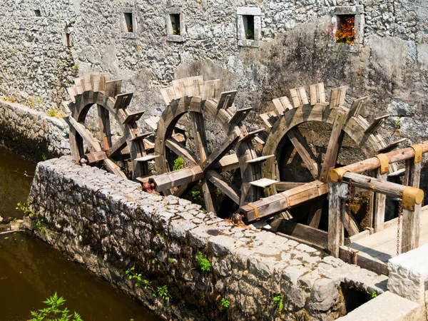 Three wheeled wooden mill — Stock Photo, Image