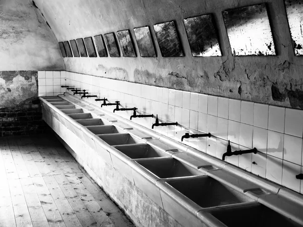 Old mass bathroom in prison — Stock Photo, Image