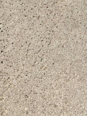 Gri desenli gözenekli duvar. Soyut taş dokusu. Asgari arkaplan.