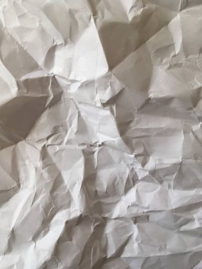 Güneş ışınları buruşmuş eski kağıt üzerinde. Asgari duvar kağıdı