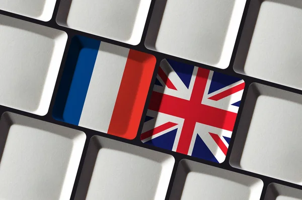 Keyboard with French France and English flag language learning translation