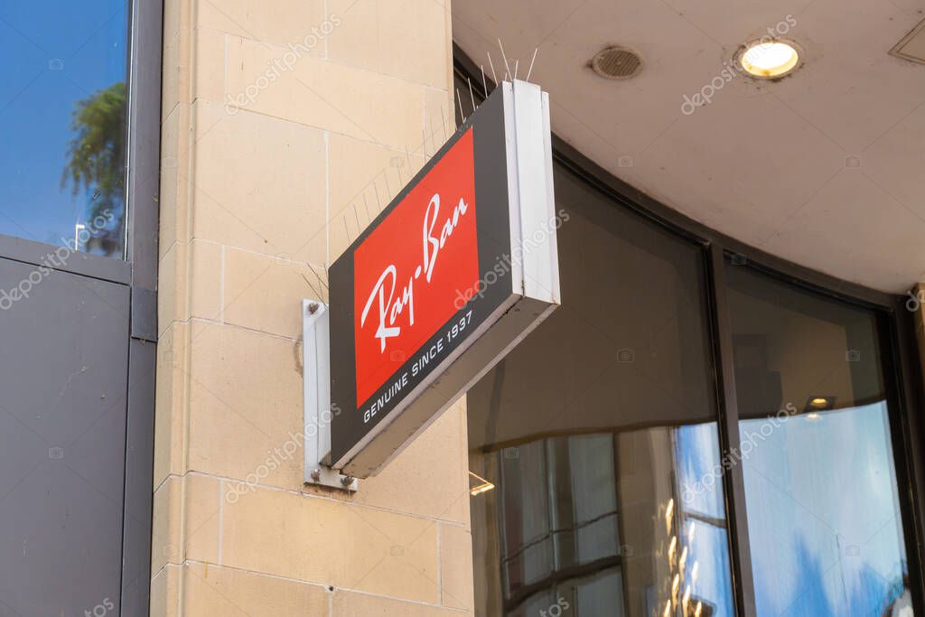 MUNICH, GERMANY - JULY 14, 2025: Ray-Ban Storefront Sign at the Store Entrance. Munich, Bavaria, Germany