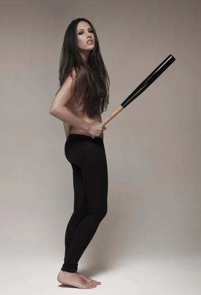 Woman holding baseball bat — Stock Photo, Image