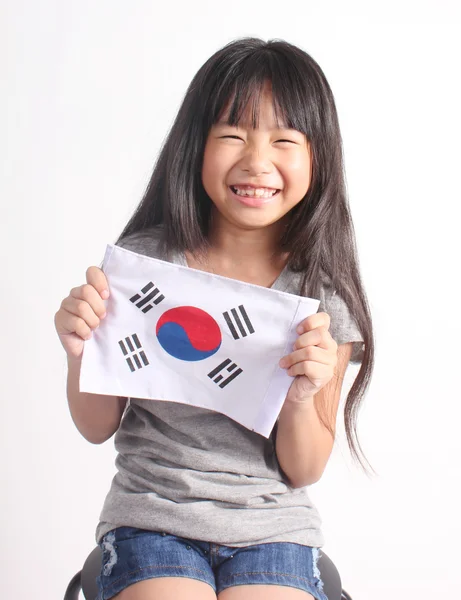 Menina bonito segurando bandeira da Coreia — Fotografia de Stock
