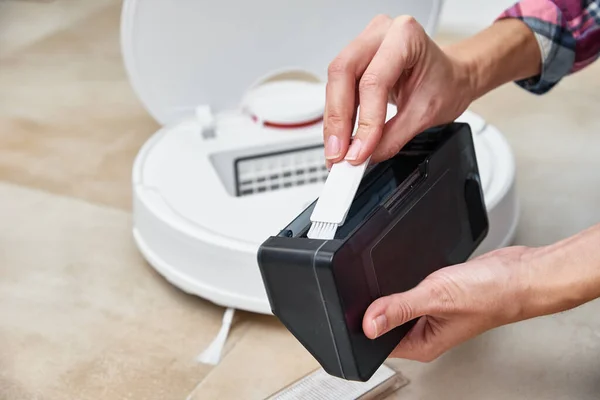 Woman Cleans Dust Container Robotic Vacuum Cleaner Household Appliances Service — Stock Photo, Image