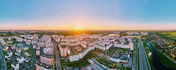 Aerial view of city residential district at sunset, panorama — Stock Photo, Image