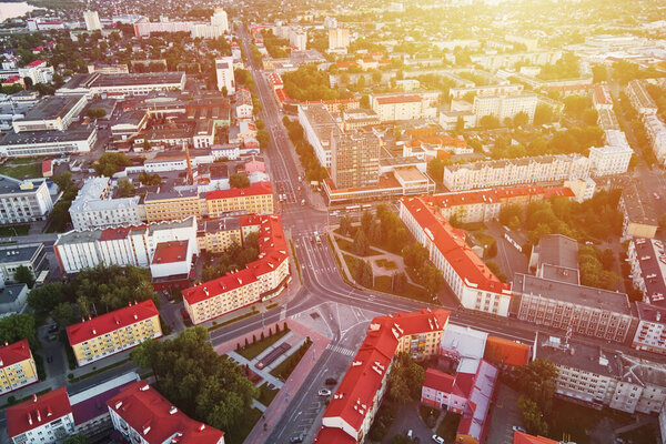 Cityscape of Gomel, Belarus. Aerial view of town architecture. City streets at sunset, bird eye view